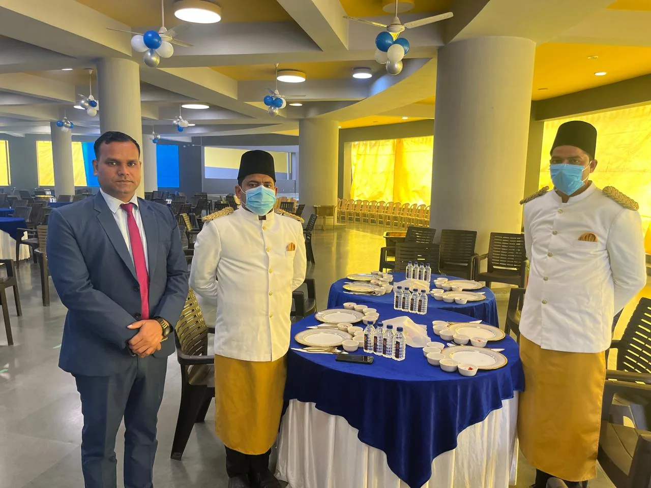 Crockery and cutlery arranged for service