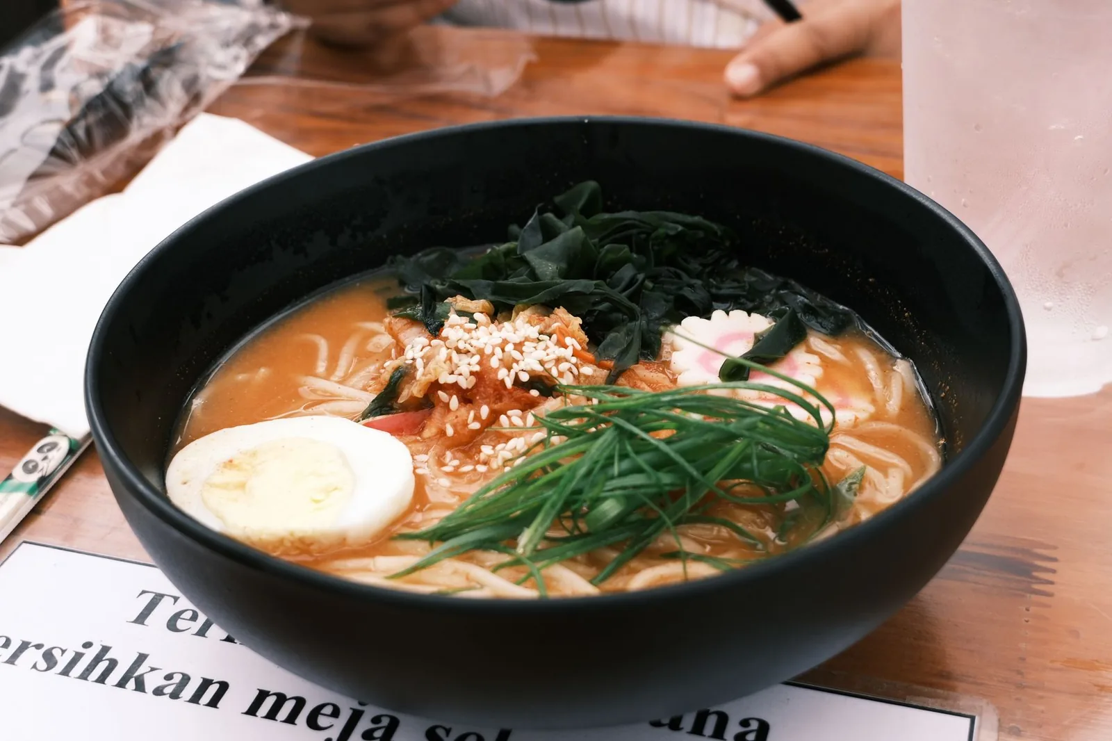 Vegetable ramen plated fresh at a live Korean counter